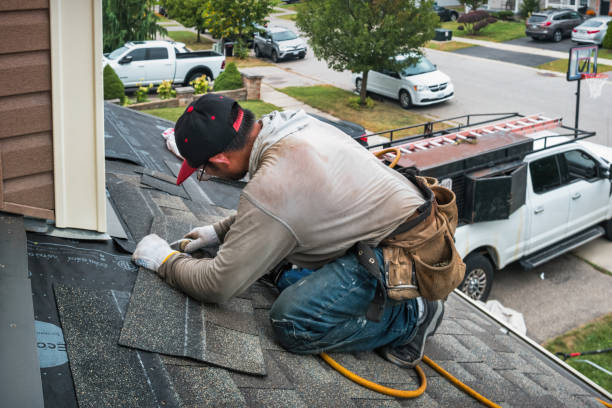 Professional Gutter Installation technician working in Lakewood, WA